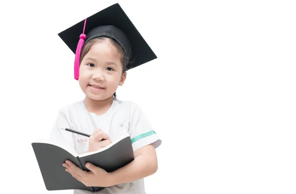 Щасливі азіатських школі дитина випускників писати книгу з диплома — стокове фото