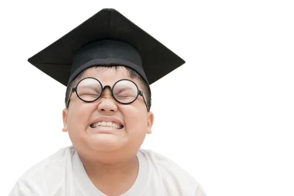 Asiatique école enfant diplômé ennuyé avec graduation cap isolé — Photo