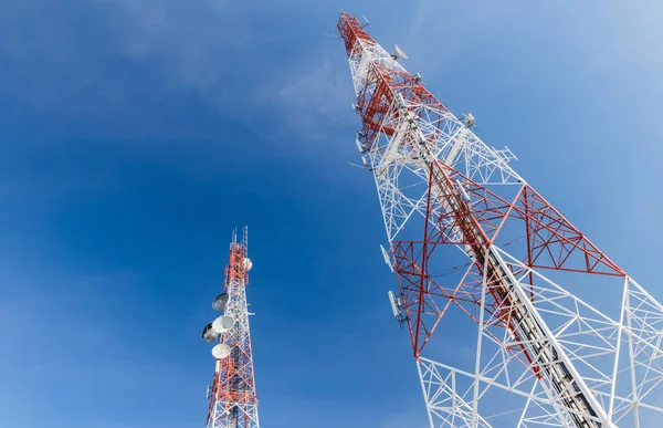 communication tower on blue sky background