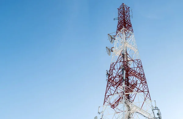 communication tower on blue sky background