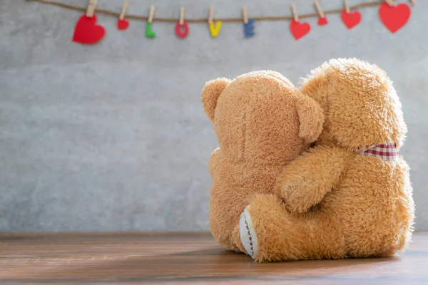 Back side of two teddy Bear with Heart on marble background — Stock Photo, Image