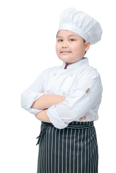 Bonito menino chef stand e sorriso isolado — Fotografia de Stock