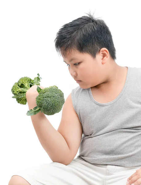 Obese fat boy holding a broccoli dumbbell isolated — Stock Photo, Image
