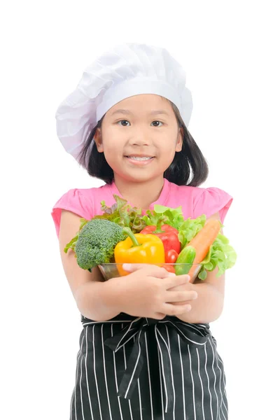 Roztomilá malá holka kuchař se zeleninou — Stock fotografie