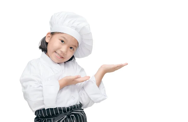Παιδί σεφ δείχνει και την παρουσίαση — Φωτογραφία Αρχείου