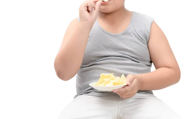 Batatas fritas em obeso gordo menino mão isolado — Fotografia de Stock