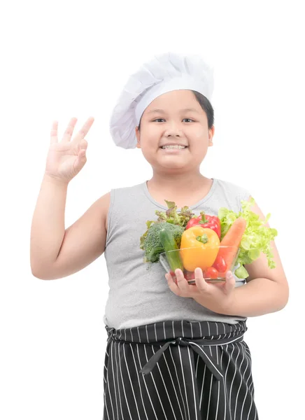 Menino chef obeso com legumes na tigela — Fotografia de Stock