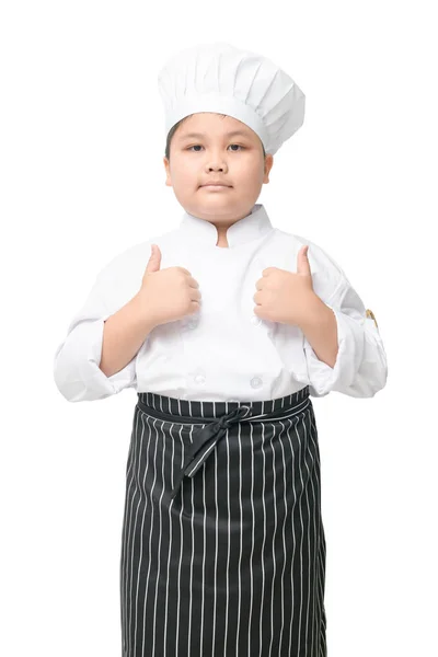 Bonito garoto chef hispânico dando os polegares para cima — Fotografia de Stock