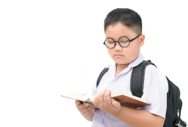 Estudiante en uniforme usar gafas libro de lectura —  Fotos de Stock