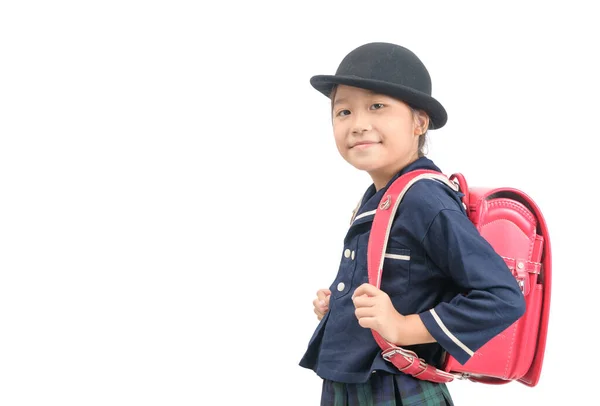 Portret van schattig aziatisch meisje met rugzak geïsoleerd — Stockfoto