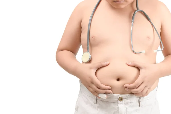 Niño gordo obeso con estetoscopio aislado sobre fondo blanco — Foto de Stock