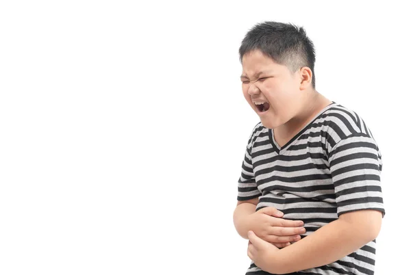 Fat boy grasps his stomach with his hand, feels a stomach ache. — Stock Photo, Image