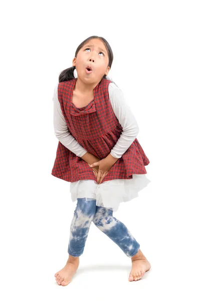 Little girl need a pee  isolated on white background — Stock Photo, Image