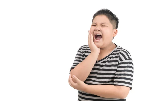 Niño obeso infeliz que sufre de dolor de muelas aislado — Foto de Stock