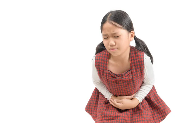 Asiático criança sofrendo de dor de estômago isolado — Fotografia de Stock