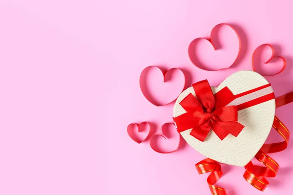 Heart gift box and heart red ribbon on pink background, — Stock Photo, Image