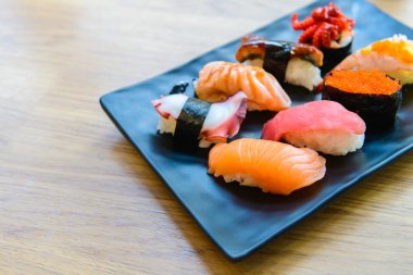Nigiri Sushi set with salmon, grouper, eel, tuna and prawn 