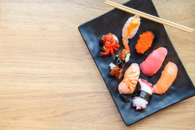 Nigiri Sushi set with salmon, grouper, eel, tuna and prawn 