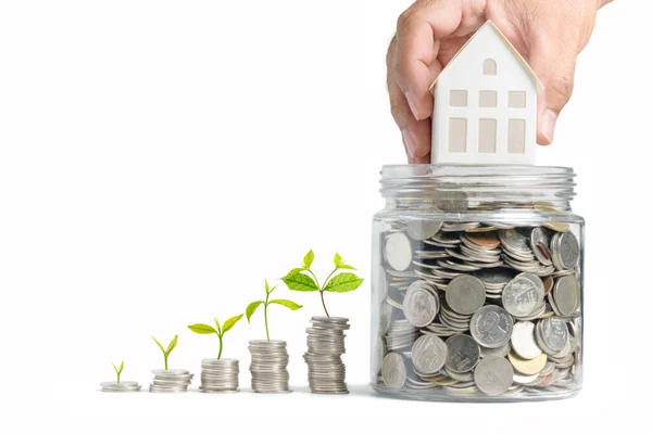 Rostoucí Peníze Hand Man Holding House Model Coins Glass Jar — Stock fotografie