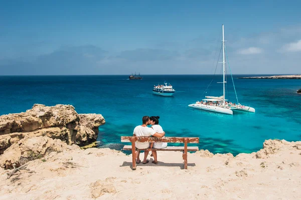 Couple Sits Bench Looks Lagoon Honeymoon Lovers Man Woman Island — Stock Photo, Image