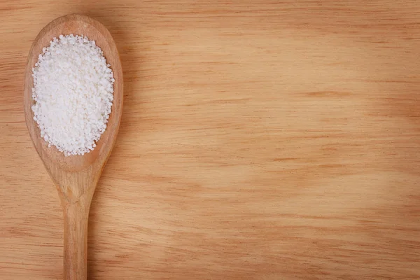 Cassava granulada (tapioca) sobre fundo de madeira — Fotografia de Stock