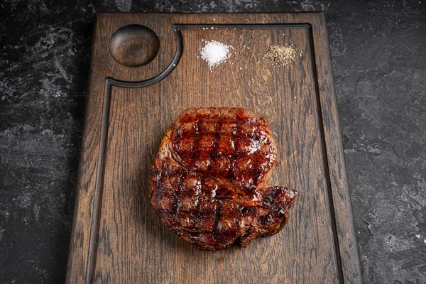 Grilled Steak Striploin Pepper Sauce Cutting Board Dark Wooden Background — Stock Photo, Image