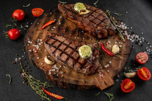 Two Large Pieces Bone Steak Wooden Board Next Sauce Waiting — Stock Photo, Image