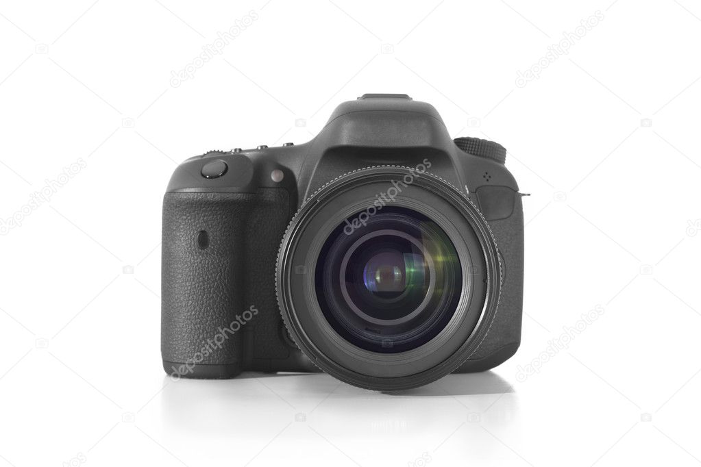 DSLR professional photo camera with a 35 mm lens on plexiglass