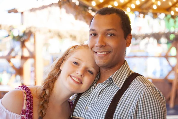 Interracial couple at Oktoberfest in Munich — Stock Photo, Image