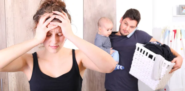 Husband overwhelmed by taking care of everything alone, because his wife is suffering from postpartum depression — Stock Photo, Image