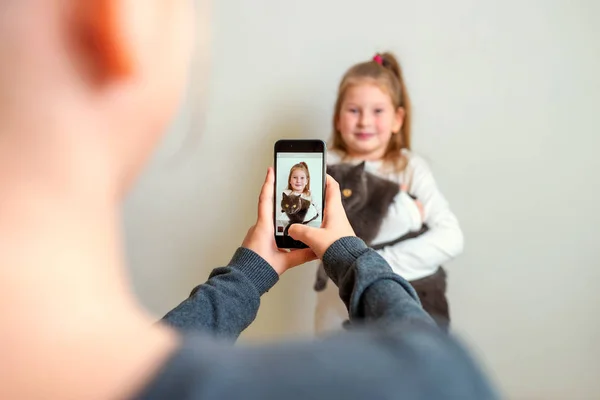 Teens record video on camera for blog. Stockbild