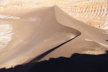 A beautiful landscape of the salt flats in Valle de la Luna (Moon Valley) in San Pedro de Atacama, Chile