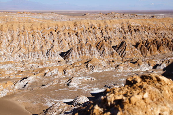 A beautiful landscape of the salt flats in Valle de la Luna (Moon Valley) in San Pedro de Atacama, Chile