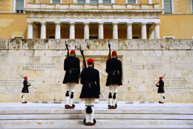 ATHENS, GREECE - 24 April 2015. Change of guard ceremony takes place in the Unknown Soldiers Tomb in front of the Parliament Building