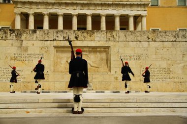 ATHENS, GREECE - 24 April 2015. Change of guard ceremony takes place in the Unknown Soldiers Tomb in front of the Parliament Building