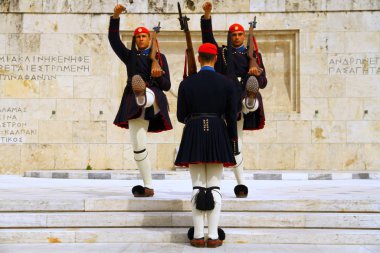 ATHENS, GREECE - 24 April 2015. Change of guard ceremony takes place in the Unknown Soldiers Tomb in front of the Parliament Building