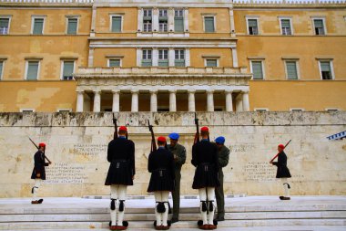 ATHENS, GREECE - 24 April 2015. Change of guard ceremony takes place in the Unknown Soldiers Tomb in front of the Parliament Building