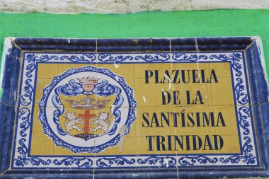 The street sign of Plazuela de la Santisima Trinidad. It means 'Holy Trinity Square' in English. clipart