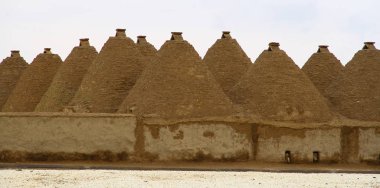 traditional conic Harran houses in Harran Sanliurfa. clipart