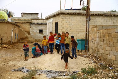 HARRAN, SANLIURFA, TURKEY - 21 Ocak 2018. Harran 'ın çocukları mahallede birlikte oynamaktan zevk alıyor..