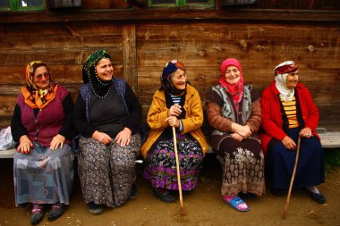 HAZINDAK HIGHLANDS, RIZE, TURKEY - 6 July 2012. Elderly women are having fun together in the village of Hazindak highlands.