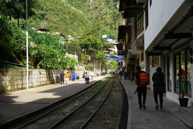 AGUAS CALIENTES, URUBAMBA RIVER VALLEY, PERU - 25 March 2019. A street view from Aguas Calientes which is the nearest town to Machu Picchu ancient city in Urubamba River valley.