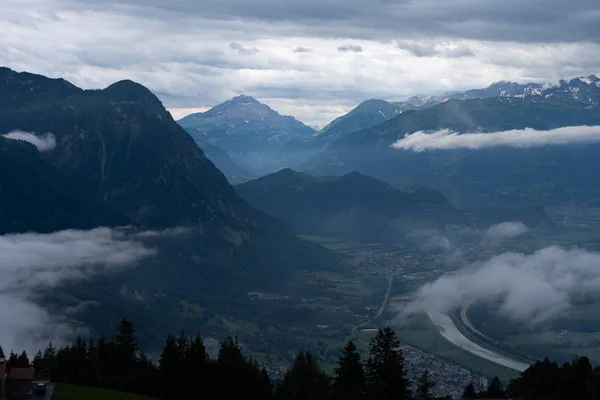 A mountain range in the clouds — 스톡 사진