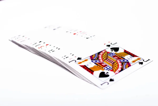 Sada hracích karet na bílém pozadí, jack na vrcholu — Stock fotografie