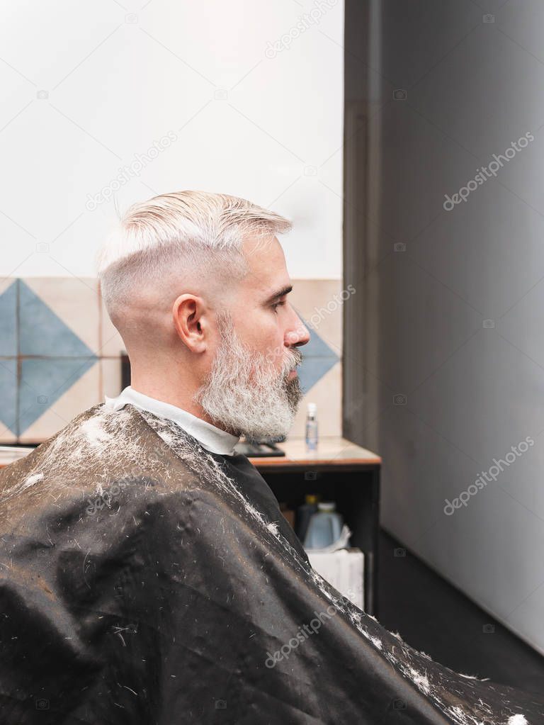 white hair man at barber shop