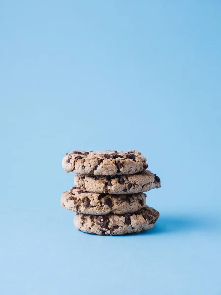 Pile of cookies isolated on blue background — Stock Photo, Image
