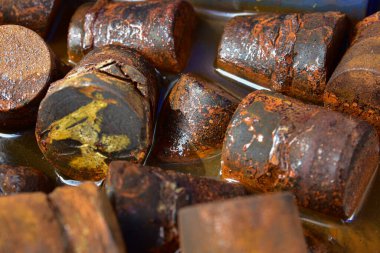 Steel immersed in water causes rust. Rust caused by the reaction between Oxygen and iron It is a type of corrosion that is a type of Corrosion which often occurs with metals such as iron. clipart