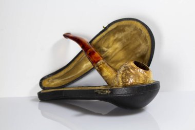 decoration of a pipe in a decorative box