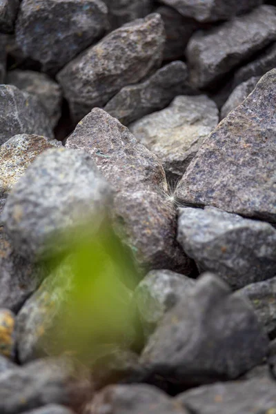 larger lumps of stone, gravel as the foundation of a wind turbine