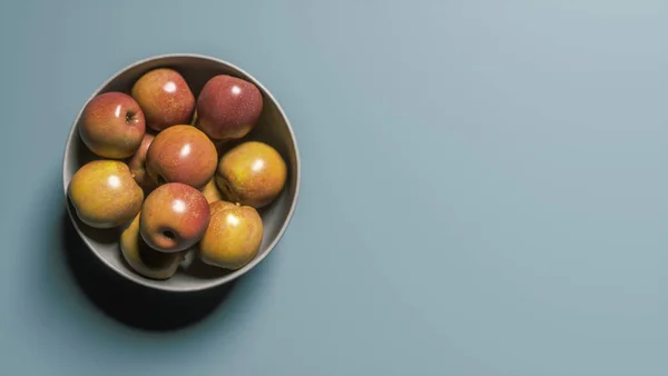 灰色の背景にボウルにリンゴの3Dレンダリング ストックフォト
